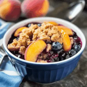 Whip up a delightful Crockpot Blueberry Peach Cobbler that’s perfect for any occasion! With sweet blueberries and juicy peaches combined in a warm, comforting cobbler, this easy recipe will please everyone. Save this simple dessert idea for your next family gathering or cozy night in!