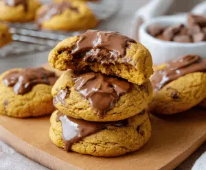 Delicious homemade pumpkin Nutella cookies with a soft, chewy texture and chocolate-hued filling, perfect for fall treats